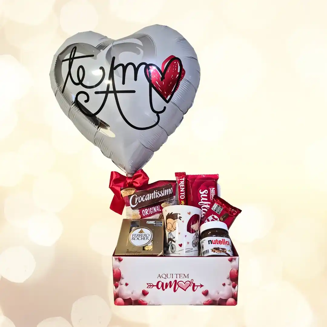 Cesta Laços de Amor com balão romântico, chocolates, Nutella e flores. Um presente encantador para surpreender no Dia dos Namorados.